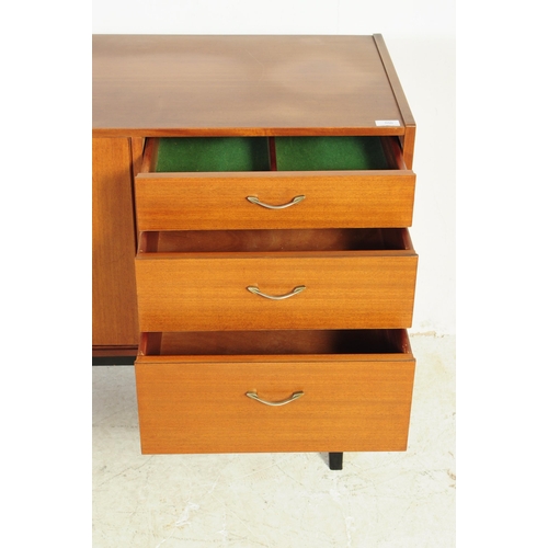 550 - Nathan Furniture - A retro mid 20th century teak veneered sideboard credenza. Of rectangular form wi... 