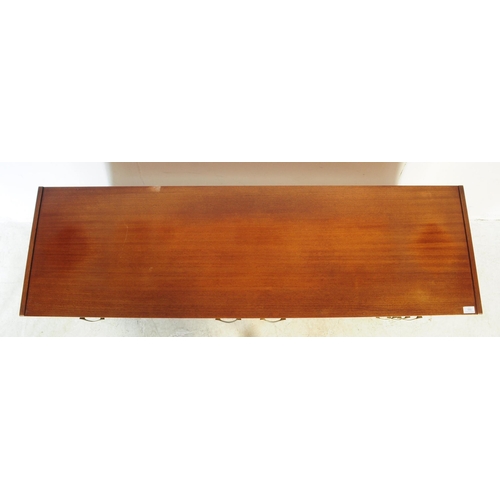 550 - Nathan Furniture - A retro mid 20th century teak veneered sideboard credenza. Of rectangular form wi... 