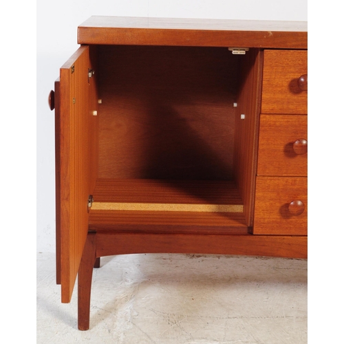 551 - Stonehill Furniture - A vintage mid 20th century teak wood sideboard credenza. Of rectangular form w... 