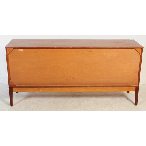 551 - Stonehill Furniture - A vintage mid 20th century teak wood sideboard credenza. Of rectangular form w... 