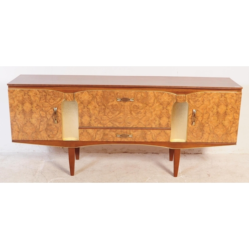 552 - Beautility Furniture - A mid 20th century walnut veneered Formica sideboard credenza. Of rectangular... 