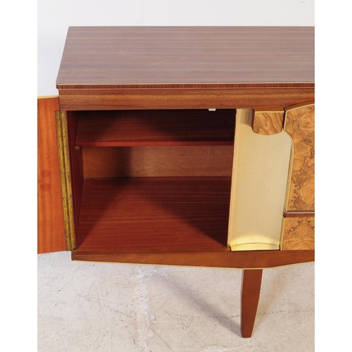 552 - Beautility Furniture - A mid 20th century walnut veneered Formica sideboard credenza. Of rectangular... 