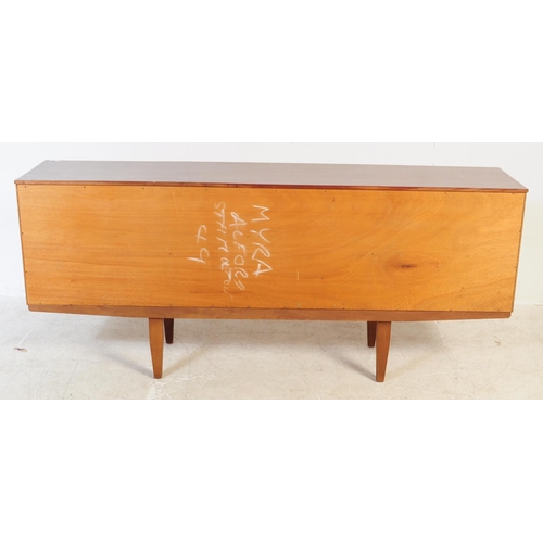 552 - Beautility Furniture - A mid 20th century walnut veneered Formica sideboard credenza. Of rectangular... 