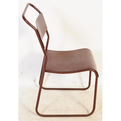 557 - A set of seven Du-al retro mid 20th century stacking industrial school chairs. Having tubular metal ... 