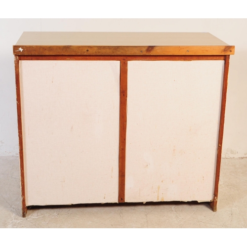 574 - Remploy - A retro mid 20th century Remploy cream kitchen unit / sideboard. The sideboard having cant... 