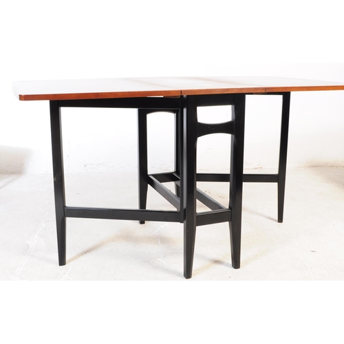 579 - Avalon - Mid 20th century dining suite comprising of drop leaf extending dining table and four dinin... 