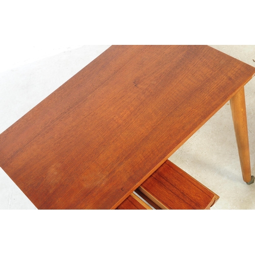 583 - After Poul Hundevad - A retro mid 20th century circa 1960s Danish inspired drop leaf teak veneered q... 