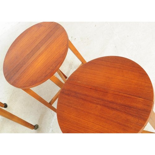 583 - After Poul Hundevad - A retro mid 20th century circa 1960s Danish inspired drop leaf teak veneered q... 