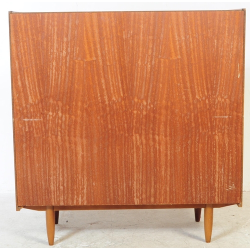 598 - British Modern Design - A mid 20th century retro teak writing bureau. Rectangular form with pull dow... 