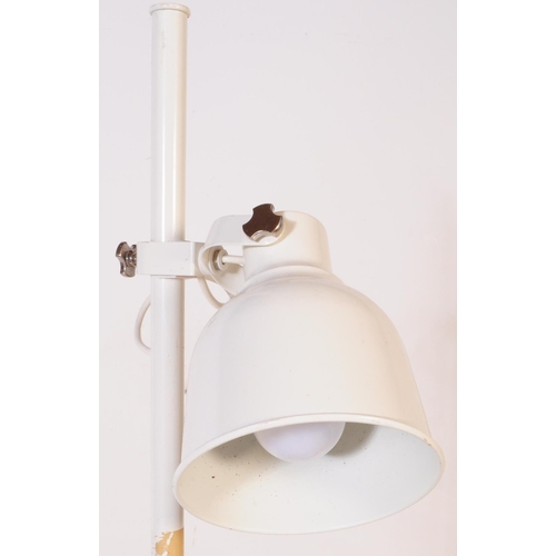 600 - Two mid 20th century floor standing standard light lamp. One of painted white metal construction wit... 