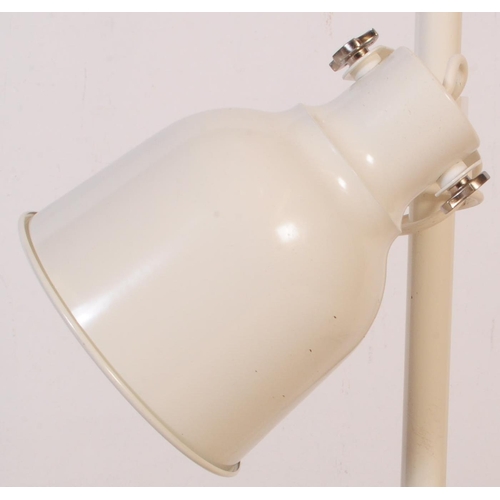 600 - Two mid 20th century floor standing standard light lamp. One of painted white metal construction wit... 