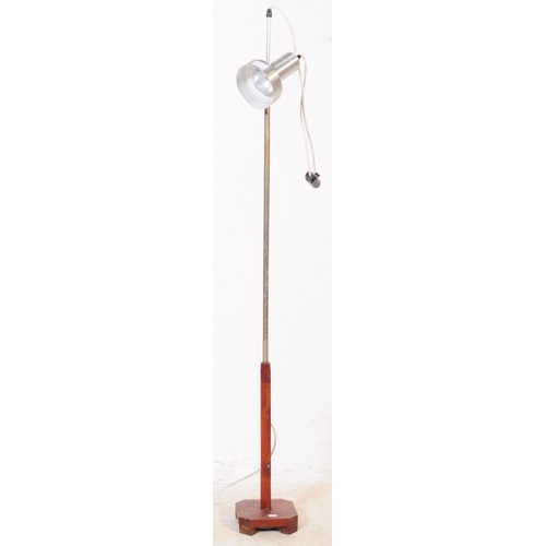 600 - Two mid 20th century floor standing standard light lamp. One of painted white metal construction wit... 