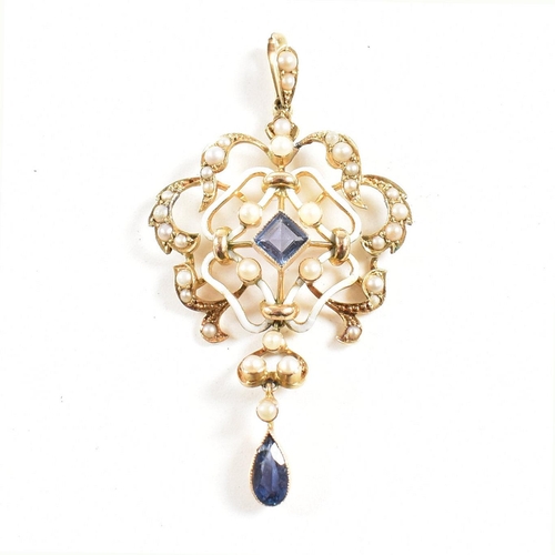 11 - An Edwardian 15ct gold enamel sapphire and pearl pendant. The pendant strung with a sapphire and pea... 