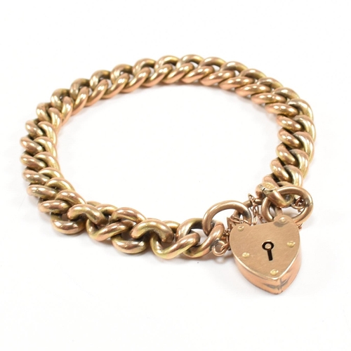 An early 20th century 9ct gold hollow curb link chain bracelet with ...