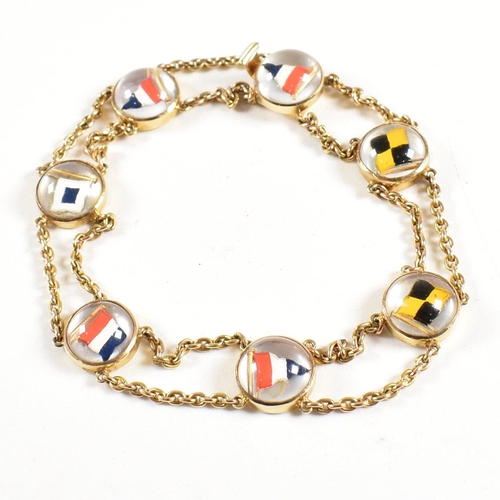 27 - An Edwardian 15ct gold Essex crystal nautical yacht pennant flag bracelet. The bracelet having round... 