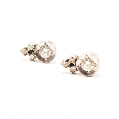 30 - A pair of 18ct white gold and diamond earrings. The earrings set with round brilliant cut diamonds s... 