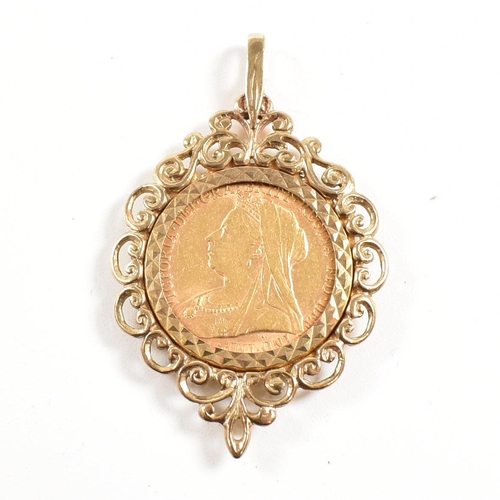 31 - A hallmarked 9ct gold mounted Victorian 1899 gold full sovereign necklace pendant. Total weight 13.7... 