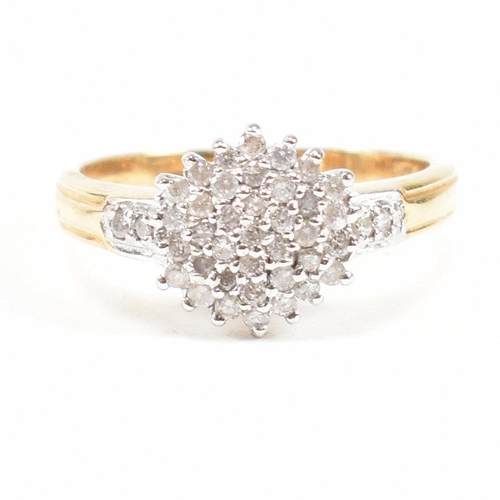 A hallmarked 18ct gold and diamond cluster ring. Estimated diamond ...