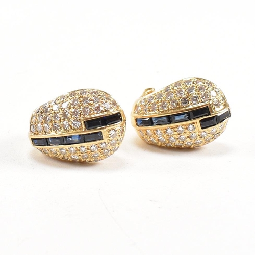 5 - A pair of Art Deco style sapphire and diamond earrings. The earrings having pav set single cut diam... 