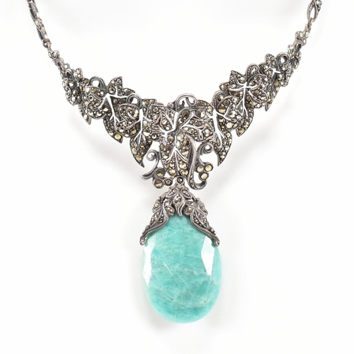 54 - A 1930s boxed Art Deco white metal marcasite and amazonite pendant necklace. The necklace strung wit... 