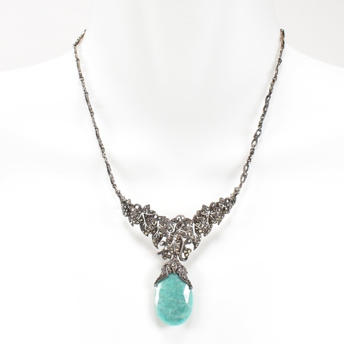 54 - A 1930s boxed Art Deco white metal marcasite and amazonite pendant necklace. The necklace strung wit... 