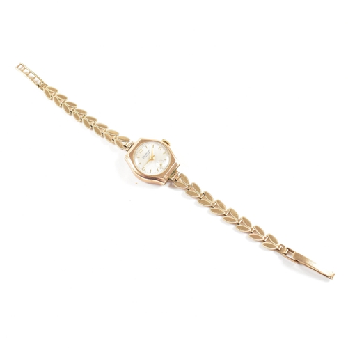 56 - A hallmarked 9ct gold Helvetia 17 jewel cocktail watch on hallmarked gold fancy leaf link strap. Wei... 