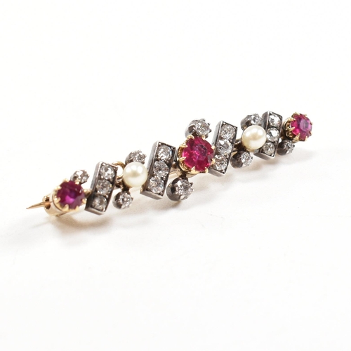 8 - An early 20th century ruby, diamond and pearl brooch pin. Principle ruby measures 4.6mm x 4.2mm x 2.... 