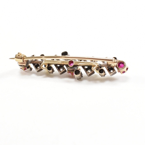 8 - An early 20th century ruby, diamond and pearl brooch pin. Principle ruby measures 4.6mm x 4.2mm x 2.... 