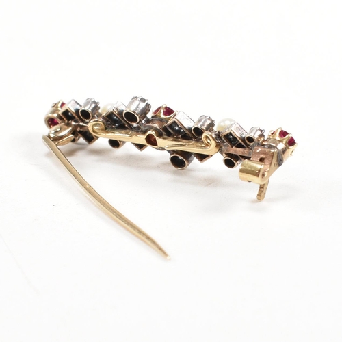 8 - An early 20th century ruby, diamond and pearl brooch pin. Principle ruby measures 4.6mm x 4.2mm x 2.... 