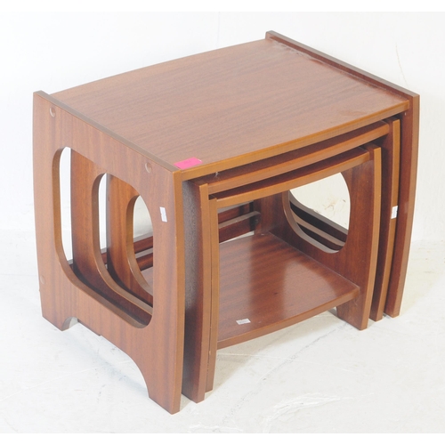 585a - British Modern Design - A  retro mid 20th century circa 1970's teak wood nest of three graduating ta... 