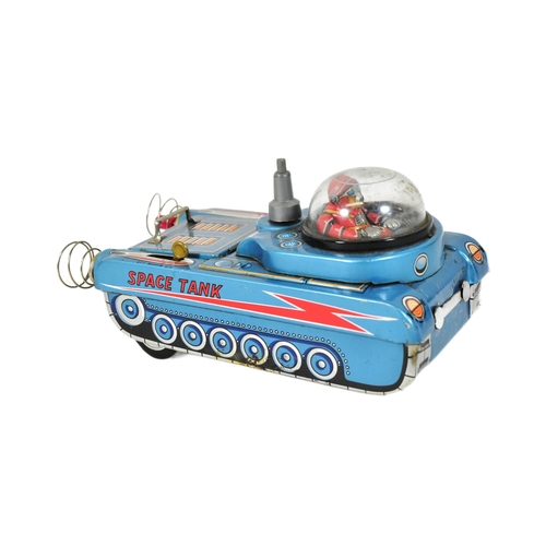 112 - A vintage Japanese ' Masudaya ' ( Modern Toys ) made tinplate battery operated Space Tank. Litho pri... 