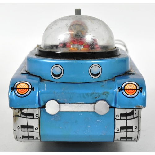 112 - A vintage Japanese ' Masudaya ' ( Modern Toys ) made tinplate battery operated Space Tank. Litho pri... 