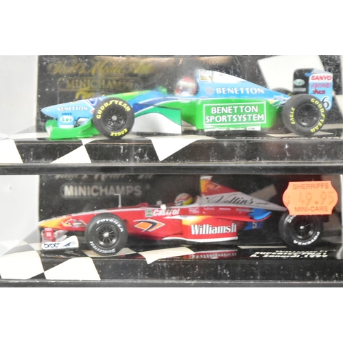 125 - Diecast - a collection of Minichamps 1/43 scale boxed diecast model Formula One cars to include; Wil... 