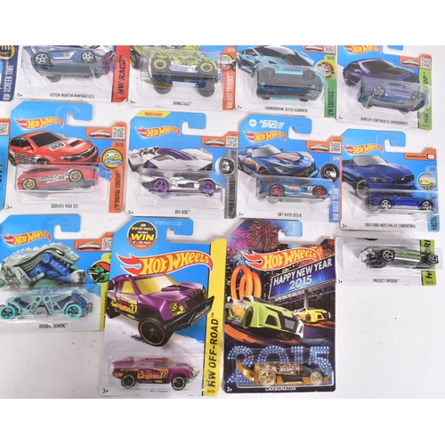 128 - Hot Wheels - Mattel - a collection of x20 assorted 2010s Mattel made HotWheels carded diecast models... 