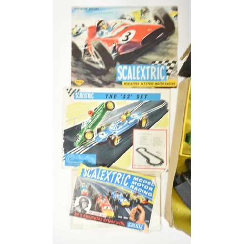 131 - Scalextric - a vintage Triang Scalextric set No. 35 along with a boxed Rostrum Starter. The set cont... 