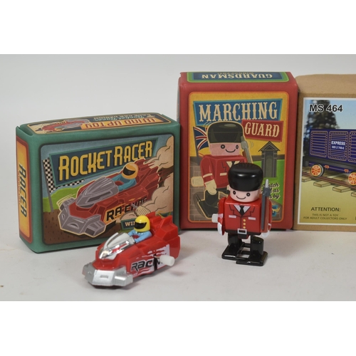 132 - Tinplate Toys - a collection of assorted tinplate / clockwork / mechanical toys to include robots, l... 