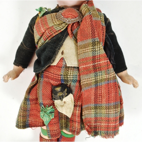 135 - An early 20th Century German Simon & Halbig bisque headed doll. Brown flirty eyes, finely painted br... 