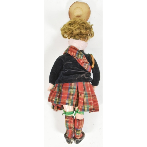 135 - An early 20th Century German Simon & Halbig bisque headed doll. Brown flirty eyes, finely painted br... 