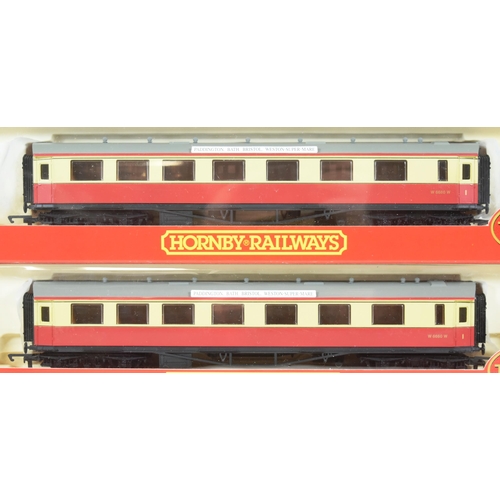 154 - Four vintage Hornby OO gauge model railway trainset coaches, comprising of x3 R4028 BR Centenary Com... 