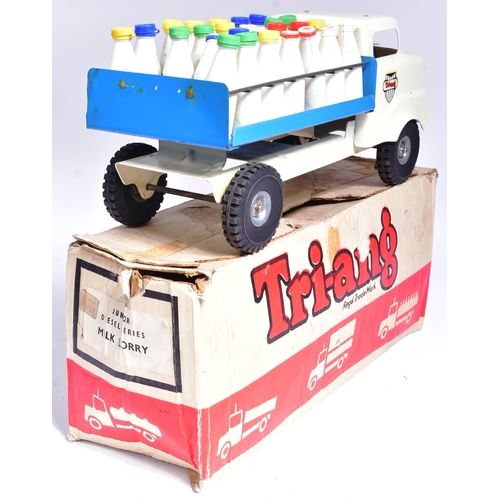 206 - Tinplate Toys - x2 vintage tinplate toys comprising a West German mechanical crane and a boxed Trian... 