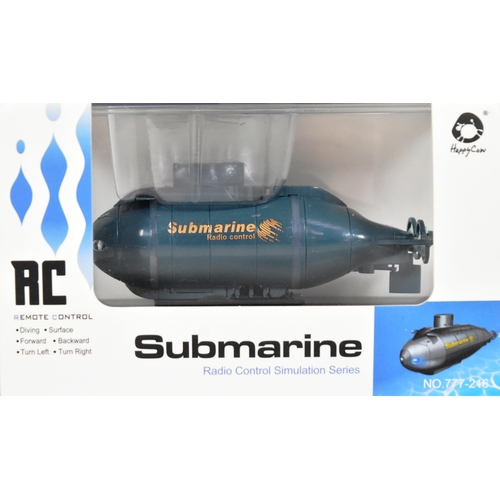 215 - Miniature RC - two miniature Radio Controlled models, the first being a ' Mini Boat ' by Utmost Spur... 