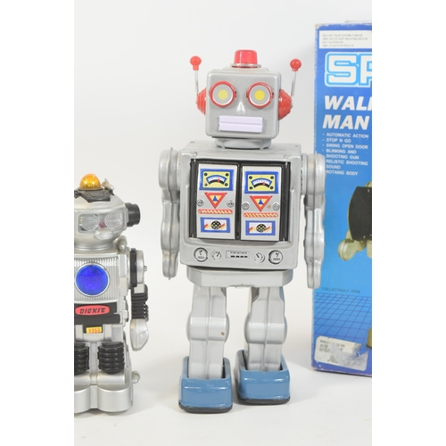 32 - Robots - a collection of assorts tinplate and plastic battery operated mechanical walking robots. Th... 