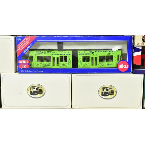 371 - Diecast - a collection of boxed diecast models of Bus and Tram interest to include; Corgi, Siku, Hon... 