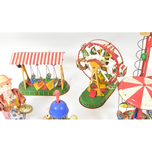 41 - Tinplate Toys - a collection of vintage West German (and other) tinplate clockwork / mechanical toys... 