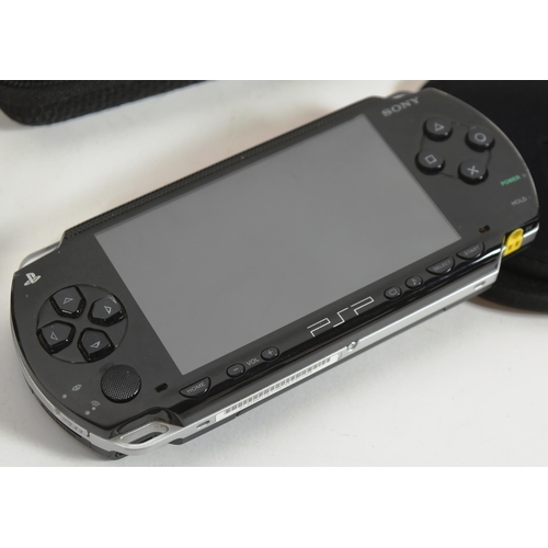 406 - Retro Gaming - an original Sony Playstation Portable PSP 1003 (black) and a Nintendo 3DS (pink)  han... 