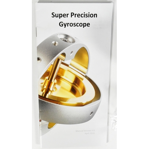 415 - A super precision educational gyroscope with electric starter motor. Brass with a light aluminium fr... 