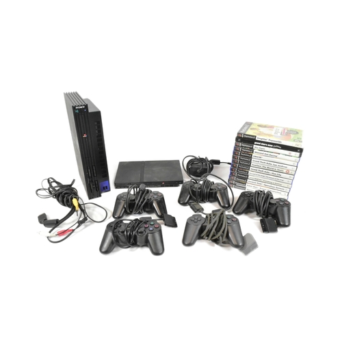 421 - Retro Gaming - an original Sony Playstation PS2 gaming bundle comprising console, PS2 slimline, cont... 