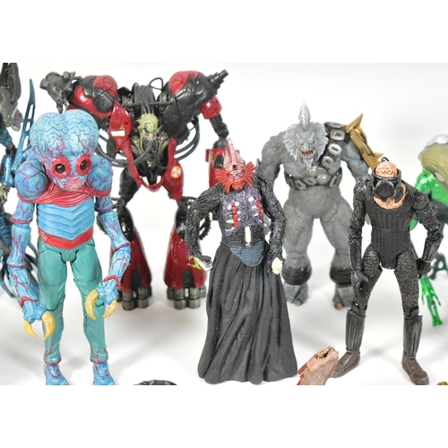 545 - Action Figures - a collection of assorted sci-fi and gaming action figures to include: Halo Promethe... 