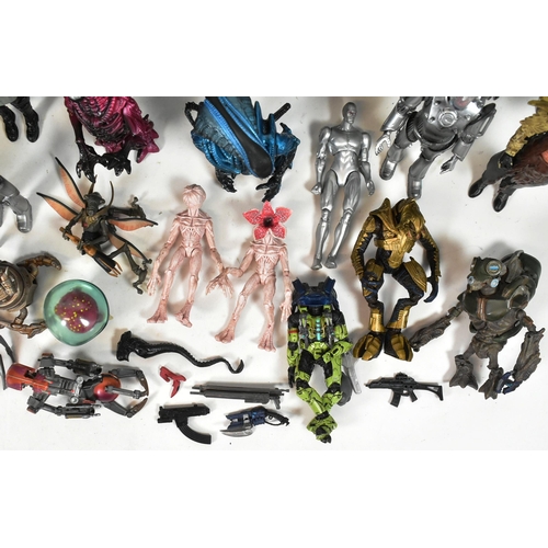 570 - Action Figures - a collection of assorted sci-fi and gaming action figures to include: NECA Predator... 