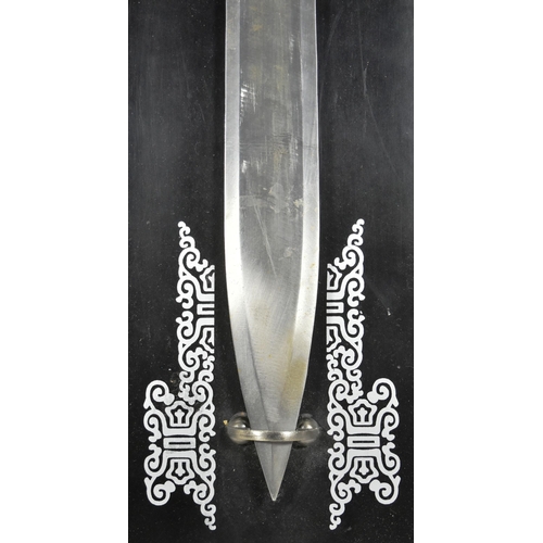 607 - A cosplay Kit Rae style fantasy sword mounted on a black wooden plaque. The pommel in the form of a ... 